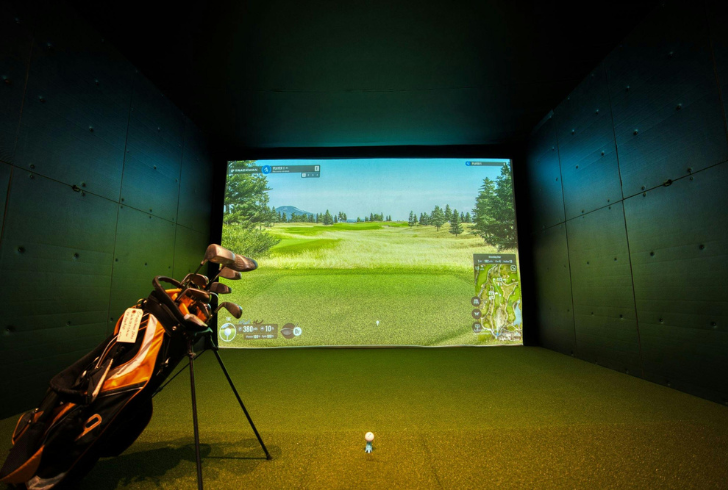 Indoor golf simulator in modern venue
